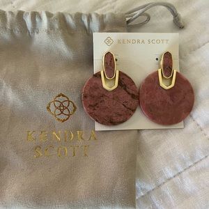 Kendra Scott earrings.
